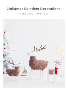 Detailed view of three handcrafted wool felt Christmas reindeer with festive embroidery