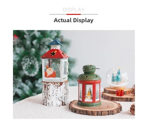 Detail of Christmas iron lanterns with Santa and Snowman graphics on a rustic wooden base