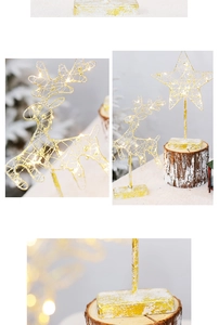 Detail of gold metal reindeer and star LED light ornaments with snow-coated bases