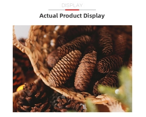 Macro shot of natural brown pine cones in a woven basket for Christmas DIY decor
