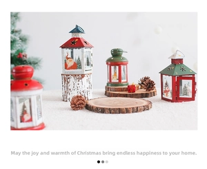 Close-up of festive Christmas iron lanterns with Santa Claus and snowy pine patterns