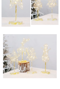 Detailed view of warm white LED Christmas tabletop ornaments in reindeer and tree shapes
