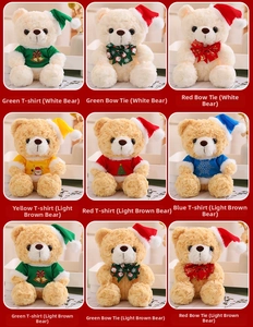 Close-up of assorted Christmas teddy bears with holiday t-shirts and festive hats