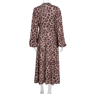 Detail view of the back concealed zipper and leopard print pattern on the long dress