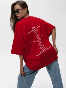 Oversize red cotton T-shirt featuring religious letter print on back and drop shoulder cut