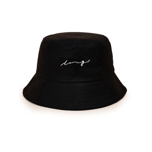Detailed view of white Loving script embroidery on a black cotton bucket hat