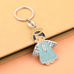 DIY enamel metal keychain featuring a cute angel with blue dress and silver wings