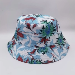 Close-up of tropical floral print bucket hat with high-quality stitching and fabric texture