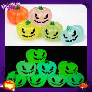 Luminous Halloween pumpkin charms showing day and night glowing effects in resin