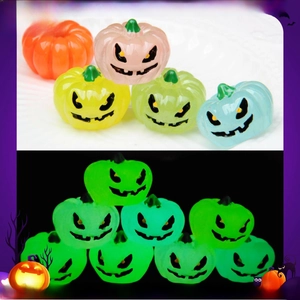 Luminous 3D pumpkin charms for Halloween DIY crafts showing day and night glow effects