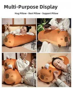 Long brown capybara plush pillow with chef hat used as a bolster and bed backrest