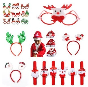 Collection of Christmas accessories including plaid reindeer headbands and holiday glasses