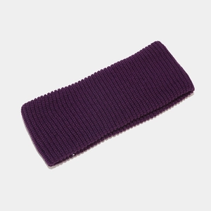 Close-up of deep purple ribbed knit headband with high-quality wool blend texture