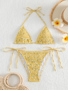 Yellow floral triangle bikini set with smocked fabric and side-tie beachwear details