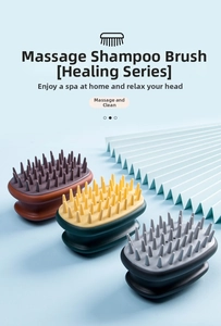 Three color variants of silicone scalp massage brushes with ergonomic grips for hair washing