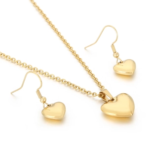 Minimalist heart-shaped jewelry set including gold necklace and fishhook earrings