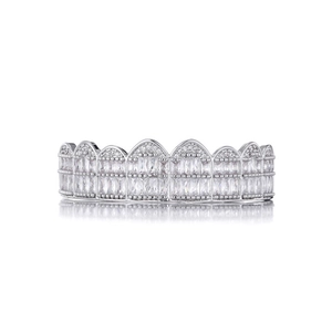 Macro shot of silver hip hop grillz featuring iced out square and round diamonds detail