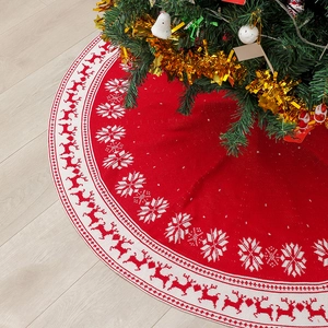 Red knitted Christmas tree skirt with white reindeer and snowflake patterns, 120cm diameter
