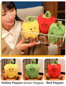 Detailed view of plush red yellow and green pepper dolls with cute smiling faces