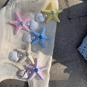 Starfish hair clips with pearls and rhinestones in five pastel colors for beach vacation