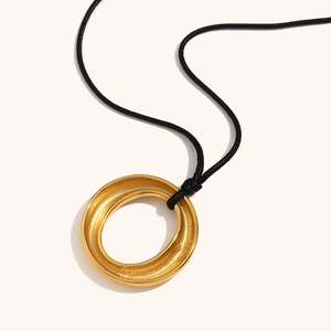 Minimalist 18K gold-plated O-ring pendant necklace with hammered texture on black cord