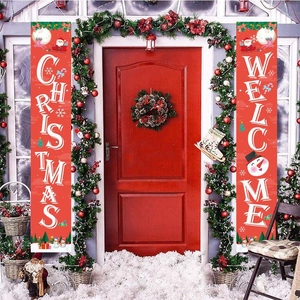 Red Christmas porch banners with white Welcome and Christmas text on a festive doorway