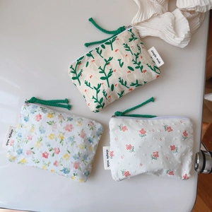 Floral cotton mini coin pouches set with zipper and green cord tassels in three patterns