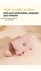 Close-up of a small light pink leather trifold wallet featuring a purple daisy flower button