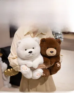 Detail of plush teddy bears showing fine faux fur texture and embroidered paw details