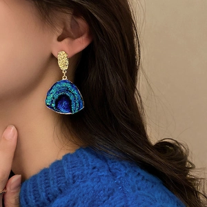 Iridescent blue-green gradient fan-shaped earrings with metallic pleated texture
