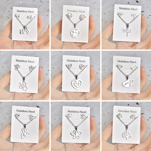 Silver stainless steel jewelry set including necklaces and earrings in various designs