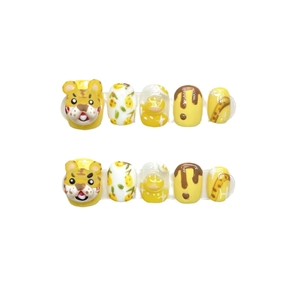 Handmade tiger-themed press-on nails set with 3D cartoon tiger and yellow lemon patterns