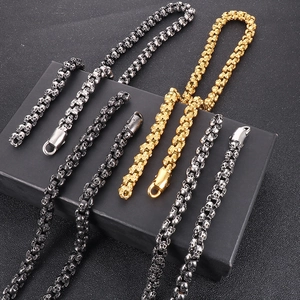 Punk style heavy skull link chain necklace and bracelet in silver and gold steel