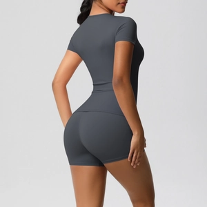 Detail of high-waist stretch shorts and slim-fit tee in premium charcoal grey fabric
