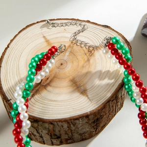 Braided multi-strand pearl necklace in red, green and white with silver lobster clasp