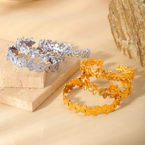 18k gold and silver stainless steel open bracelets with floral leaf cutout designs