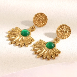 Detailed close-up of 18K gold plated earrings featuring green agate stones and fan-shaped patterns