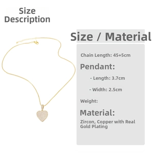Detail view of heart pendant necklace in gold-plated copper with cubic zirconia stones
