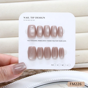 Elegant brown cat-eye press-on nails set with glossy finish and polished square-oval shape