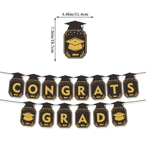 Guirlande CONGRATS GRAD noir et or avec chapeaux de diplôme pour décoration 2026