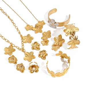 Golden flower jewelry set with stainless steel necklaces, rings and pearl earrings