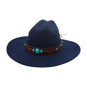 Detail of navy fedora hat featuring brown leather band and turquoise stone embellishments