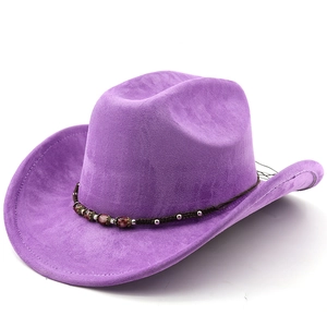 Detail of purple faux suede cowboy hat with woven band and decorative bead accents