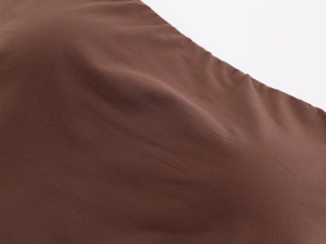 Close-up of the dark brown high-elastic fabric texture for this strapless tube top