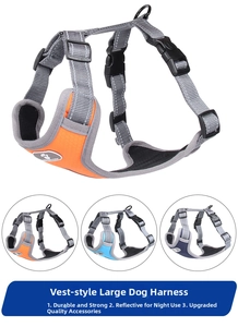 Close-up of reflective vest-style dog harness with breathable mesh and sturdy metal D-ring