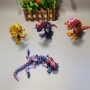 Detailed close-up of 3D printed dinosaur skeletons with movable joints in various colors