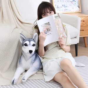 Realistic husky plush toy dog presented in a cozy home environment with a lifestyle feel