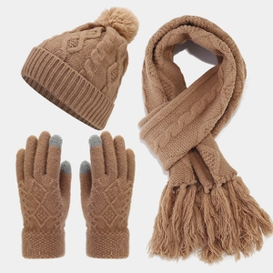 Winter 3-piece knit set including a camel pom-pom hat, fringe scarf, and touchscreen gloves