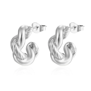 Pair of silver stainless steel earrings with woven knot C-shape design on white background
