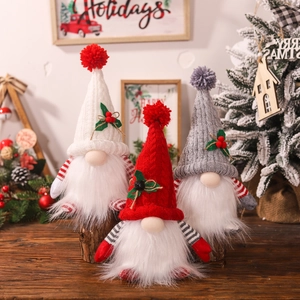 Three Christmas glowing gnomes with knit hats on wood base for holiday home decor
